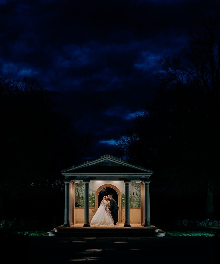 rowton castle wedding photography evening wedding portrait in Rowton Castle garden with couple