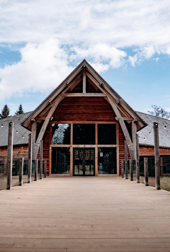 The Mill Barns Shropshire – rustic wooden barn wedding venue by the lake.