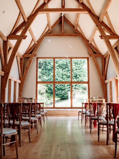 The Mill Barns Shropshire – rustic wooden barn wedding venue by the lake.