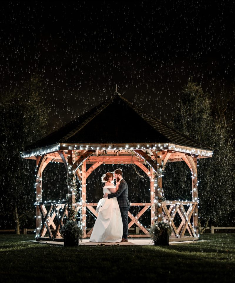 rain on your wedding day couple portraits