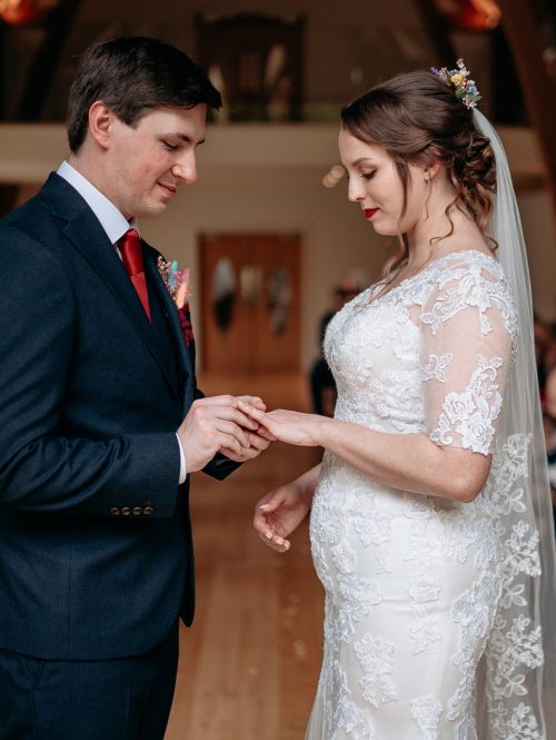Bride and groom ring at The Mill Barns