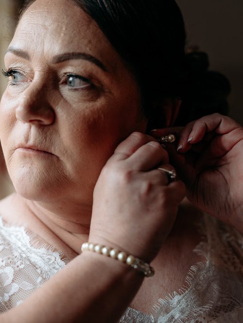 Bride getting ready with family at The Grain Loft wedding in Shropshire