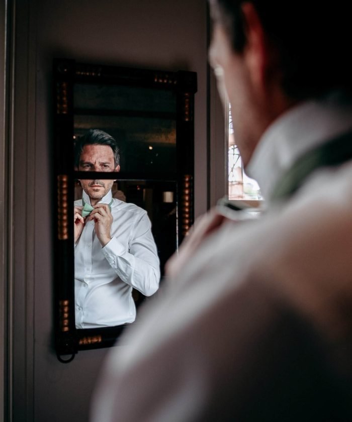 wedding photographer groom prep